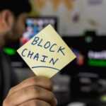 person holding sticky note