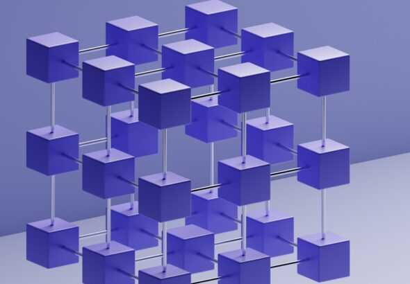 a group of purple cubes hanging from a metal bar