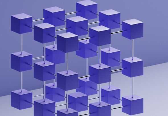 a group of purple cubes hanging from a metal bar